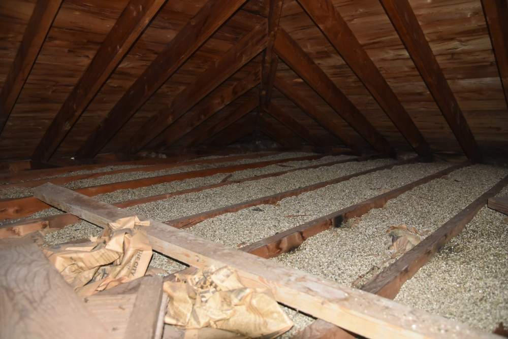 Cost to Remove Asbestos Insulation in Your Attic: 2024 Update Asbestos-containing attic insulation, asbestos waste, complete removal, roofing materials, average costs, environmental protection agency