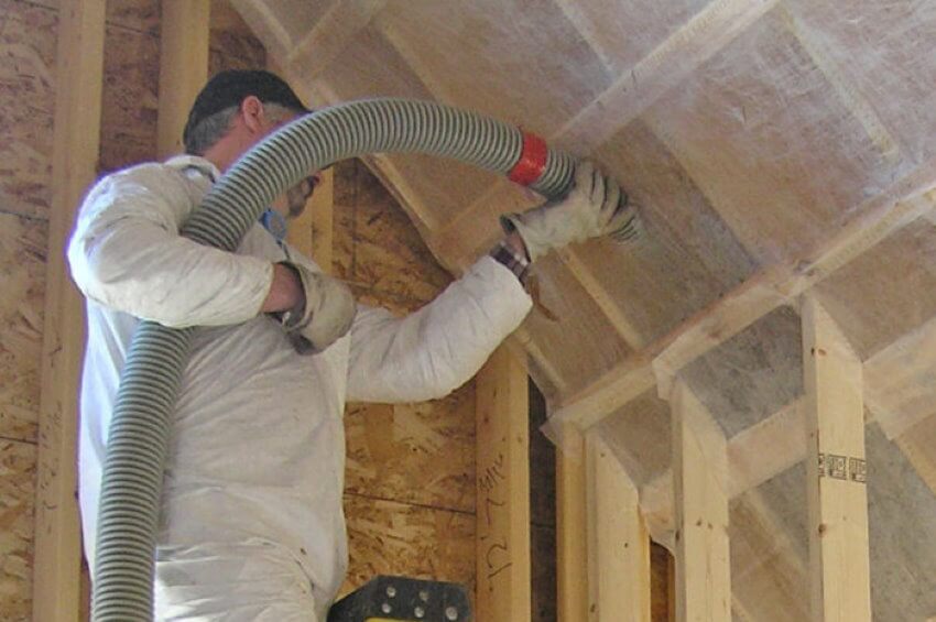 Cellulose vs Fiberglass Insulation: All You're Looking for in One Post Blowing cellulose insulation under the mesh, attic insulation , insulation blowing machine, blown in insulation, cellulose and fiberglass